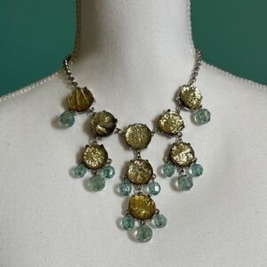 Gold and Silver Cascading Necklace with Ornate Design